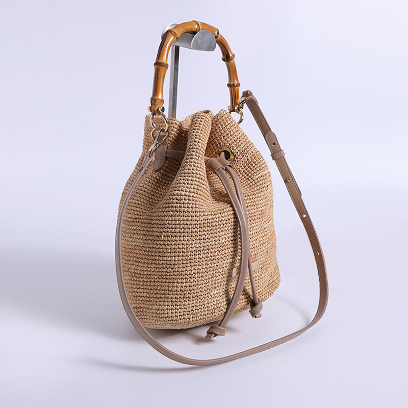 Imported raffia hand hook sea stall wind leather bamboo hand bag composed of woven fine crochet bag
