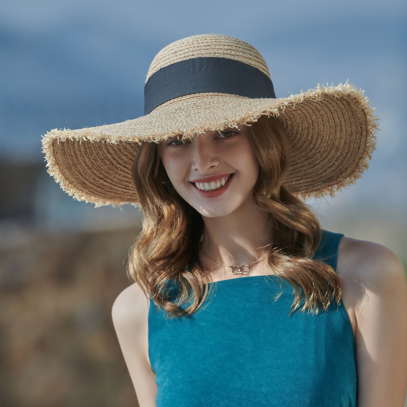Black bow straw hat spring and summer new leisure play beach hat knitted female Korean version of the sun hat outdoor sunshade sun hat