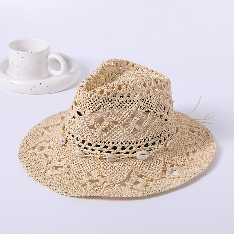 Straw hat spring and summer new leisure play beach hat hollow woven female European and American style cowboy hat outdoor sunshade hat