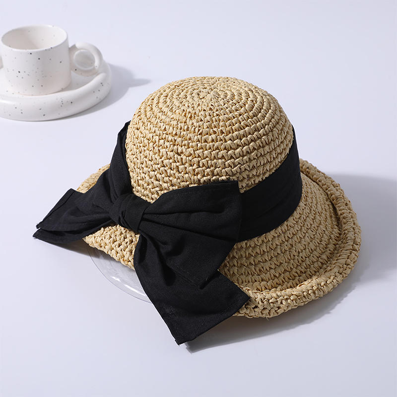 Black bow decorative straw hat spring and summer new leisure play beach hat knitted female Korean version of the sun hat outdoor sun protection hat